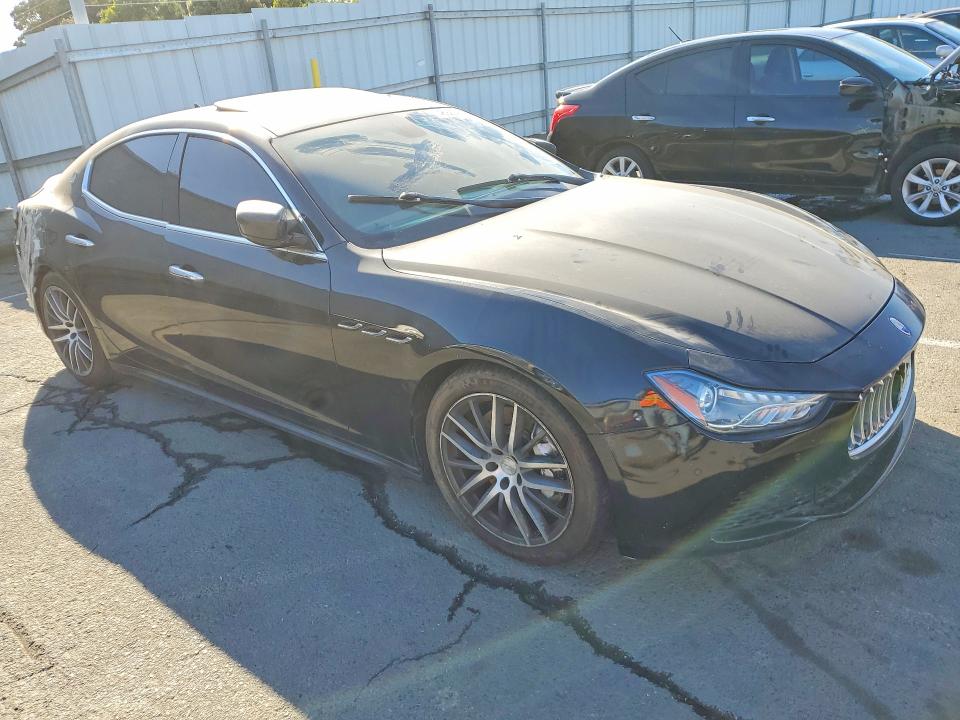 2014 Maserati Ghibli VIN ZAM57RTA9E1085914 COPART salvage auction — SIDE, Fl - Dis/Dlr/Exp Only Clean Title, sold $2,100 on 2026-07-31 (photo 4)