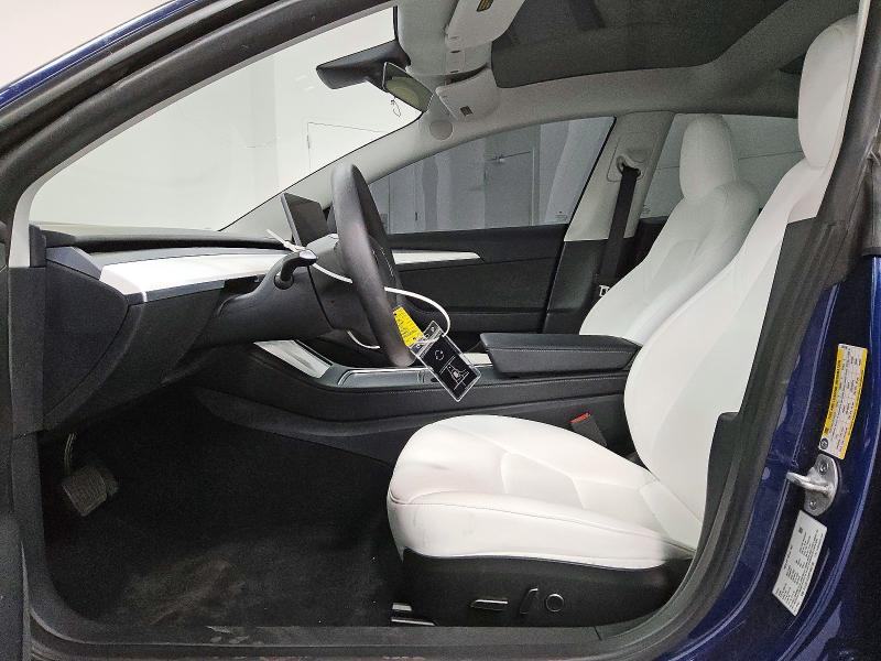 2023 Tesla Model 3 VIN 5YJ3E1EA9PF665190 COPART salvage auction — SIDE, IN - CERTIFICATE OF TITLE, sold $9,000 on 2026-07-23 (photo 7)