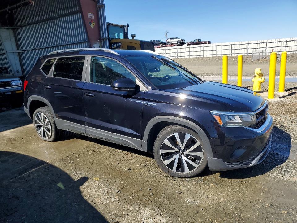 2024 Volkswagen Taos VIN 3VVSX7B24RM061827 COPART salvage auction — SIDE, Salvage Title, sold $2,100 on 2026-07-09 (photo 4)