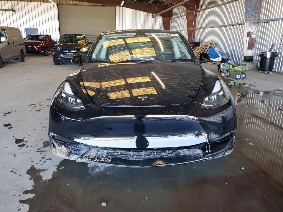 2023 Tesla Model y VIN 7SAYGAEE9PF901486 COPART salvage auction — REAR END, Salvage Title, sold $8,200 on 2026-07-13 (photo 5)