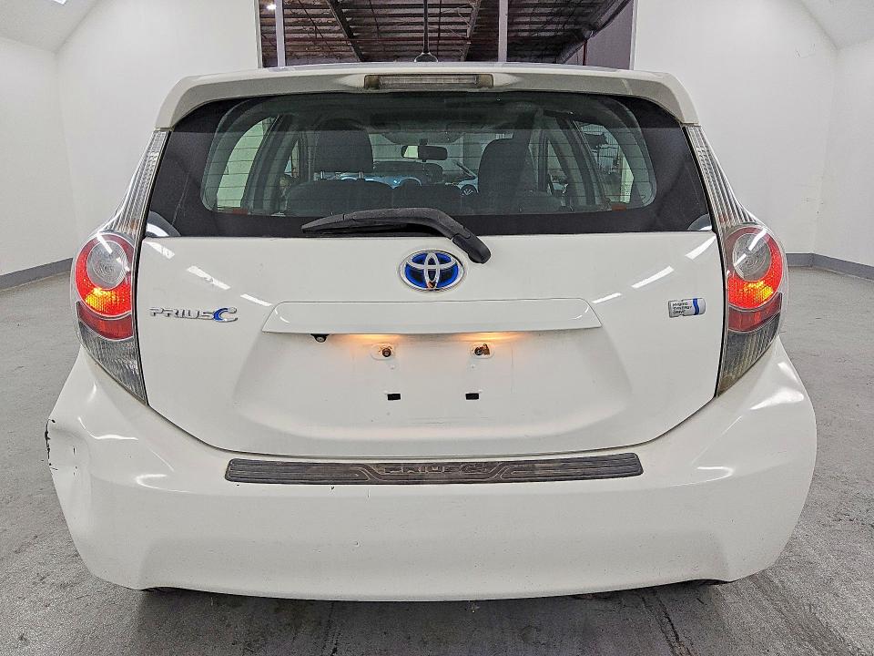 2012 Toyota Prius c VIN JTDKDTB38C1026463 COPART salvage auction — MINOR DENT/SCRATCHES, Ca - Lien Papers-Salvage Or Ac, sold $1,250 on 2026-07-02 (photo 6)