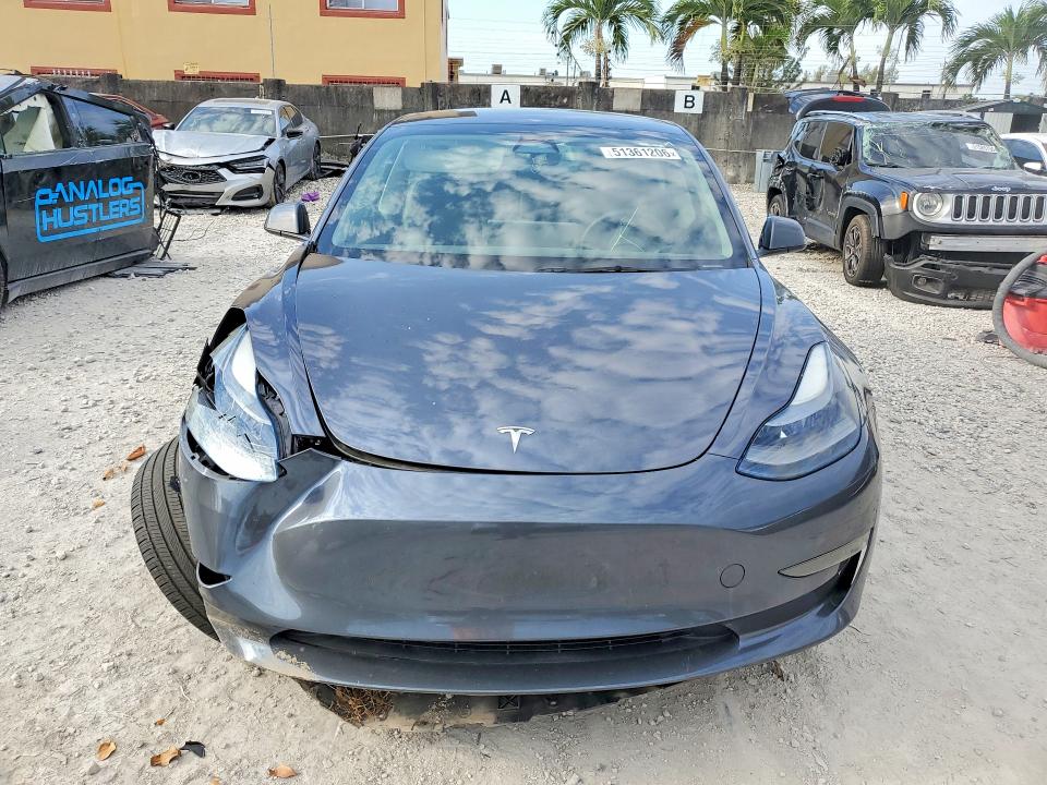 2023 Tesla Model 3 VIN 5YJ3E1EAXPF672312 COPART salvage auction — FRONT END, FL, sold $7,700 on 2026-07-24 (photo 5)