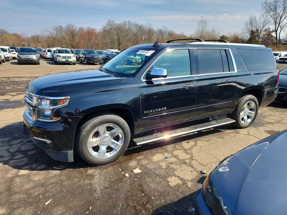2015 Chevrolet Suburban VIN 1GNSKKKCXFR549870 — COPART salvage auction photo