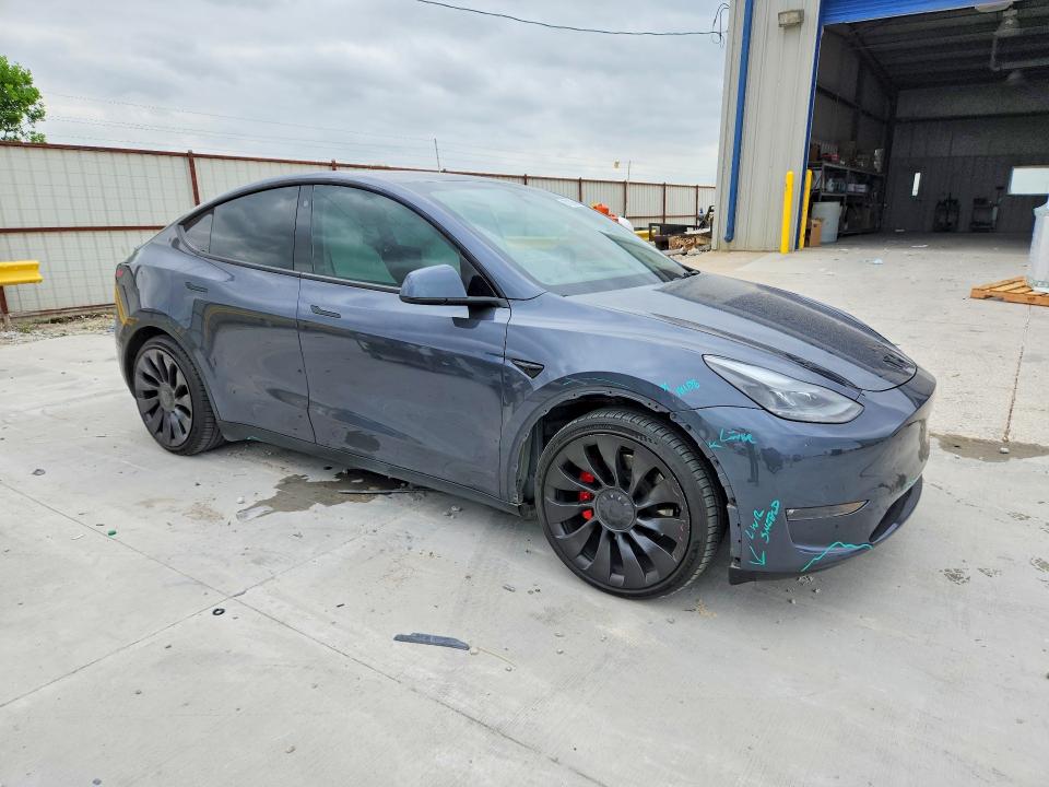 2023 Tesla Model y VIN 7SAYGDEF6PF620921 COPART salvage auction — FRONT END, Tx - Certificate Of Title, sold $5,100 on 2026-07-17 (photo 4)
