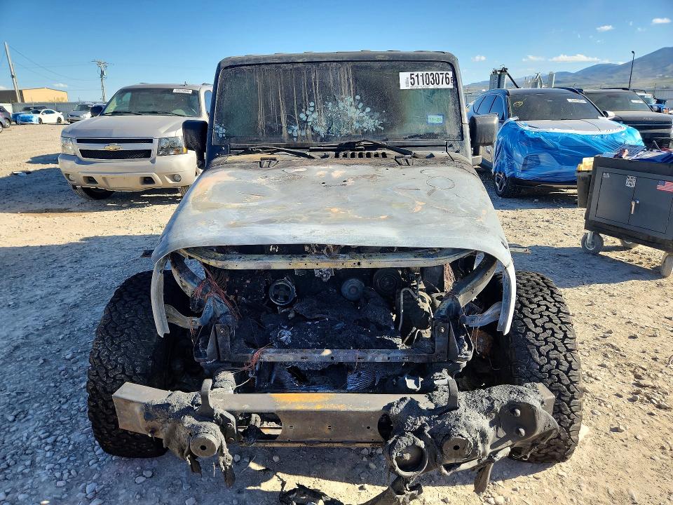 2016 Jeep Wrangler / VIN 1C4AJWAG7GL191005 COPART salvage auction — BURN, Tx - Salvage Vehicle Title, sold $1,300 on 2026-07-10 (photo 5)