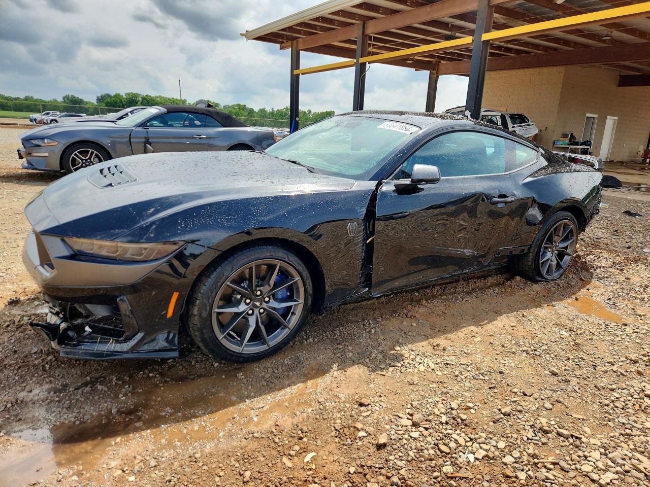 2025 Ford Mustang VIN 1FA6P8R02S5499726 COPART salvage auction — Side, AL - CERT OF TITLE-SALVAGE TITLE, sold $36,000 on 2026-07-01 (photo 1)