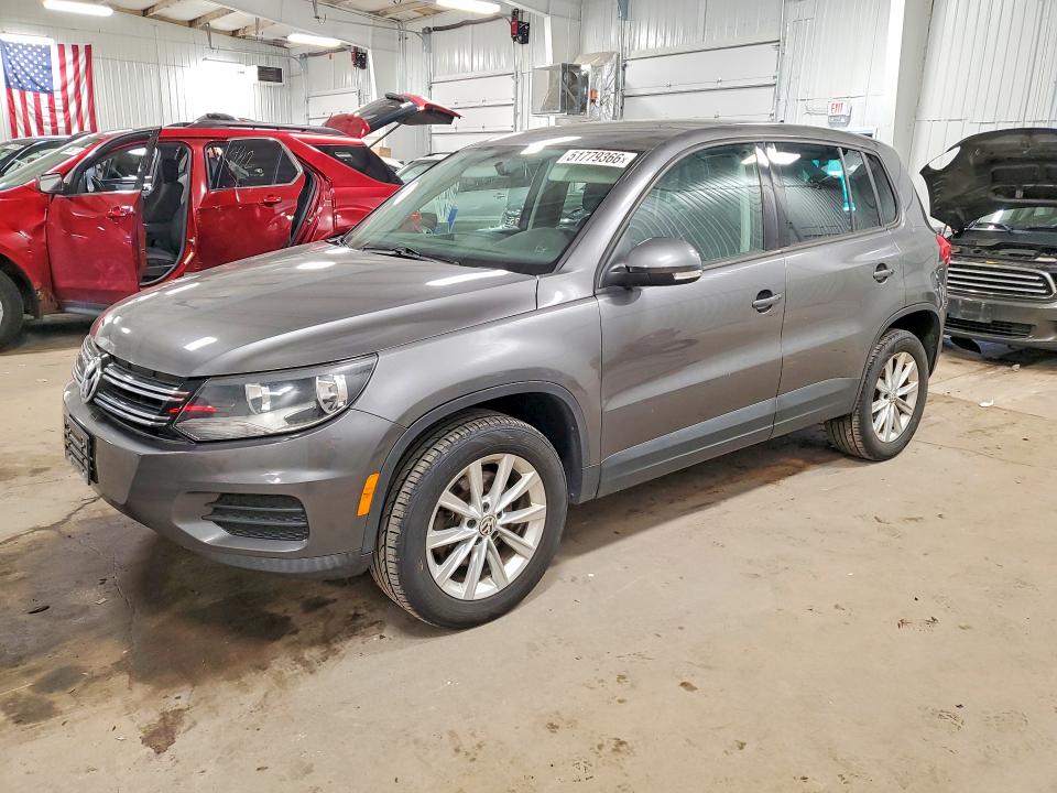 2014 Volkswagen Tiguan VIN WVGBV3AX6EW543358 COPART salvage auction — SIDE, Mn - Cert Of Title-Prior Salvage, sold $525 on 2026-07-14 (photo 1)