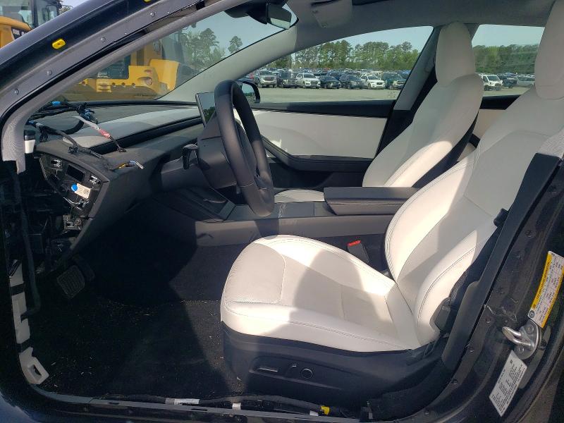 2026 Tesla Model 3 VIN 5YJ3E1EA4TF132559 COPART salvage auction — REAR END, Nc - Salvage Certificate Of Title, sold $13,000 on 2026-07-16 (photo 7)