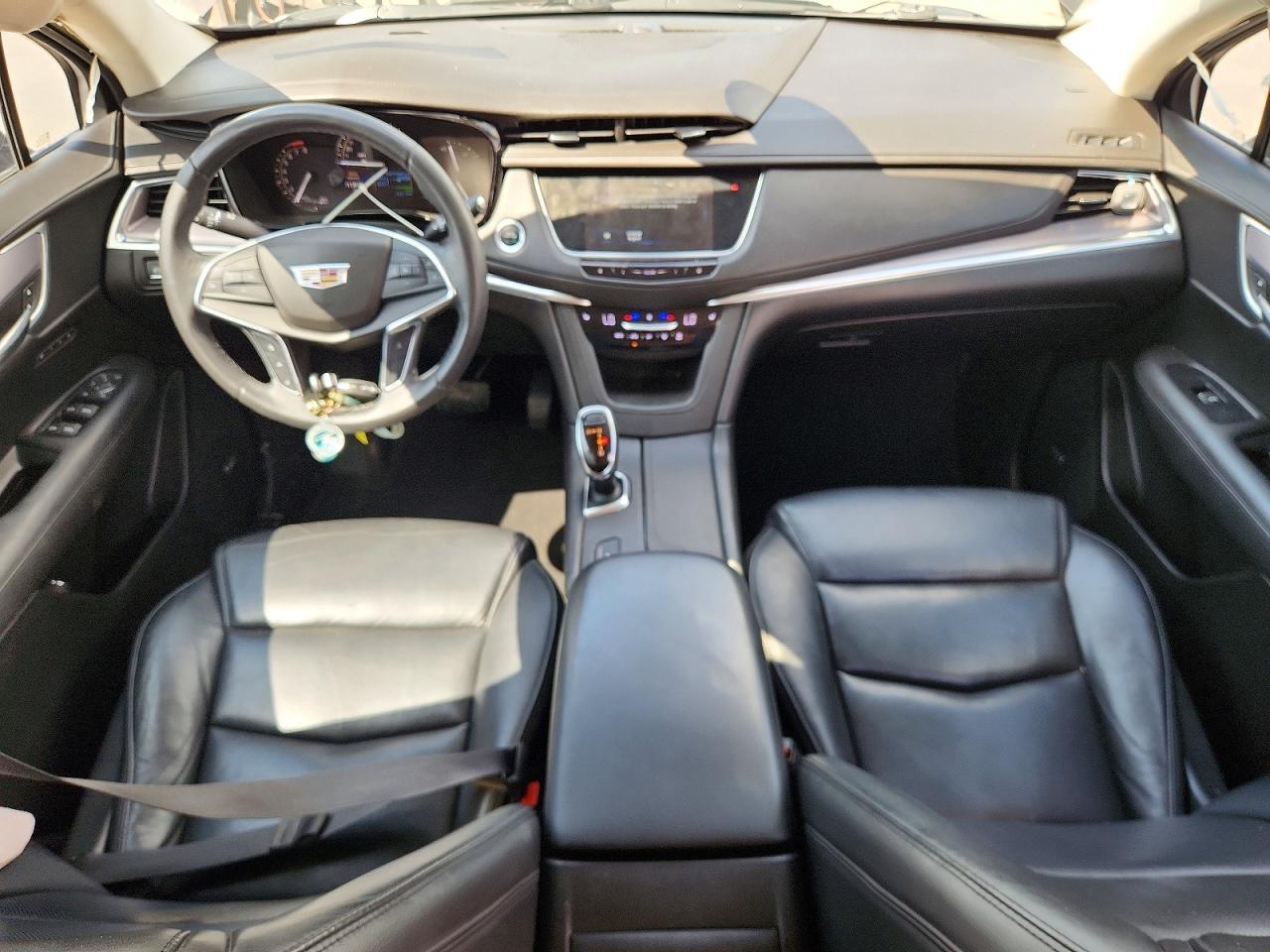 2018 Cadillac XT5 VIN 1GYKNCRS6JZ104791 COPART salvage auction — Side, TX - SALVAGE VEHICLE TITLE, sold $4,800 on 2026-06-25 (photo 8)