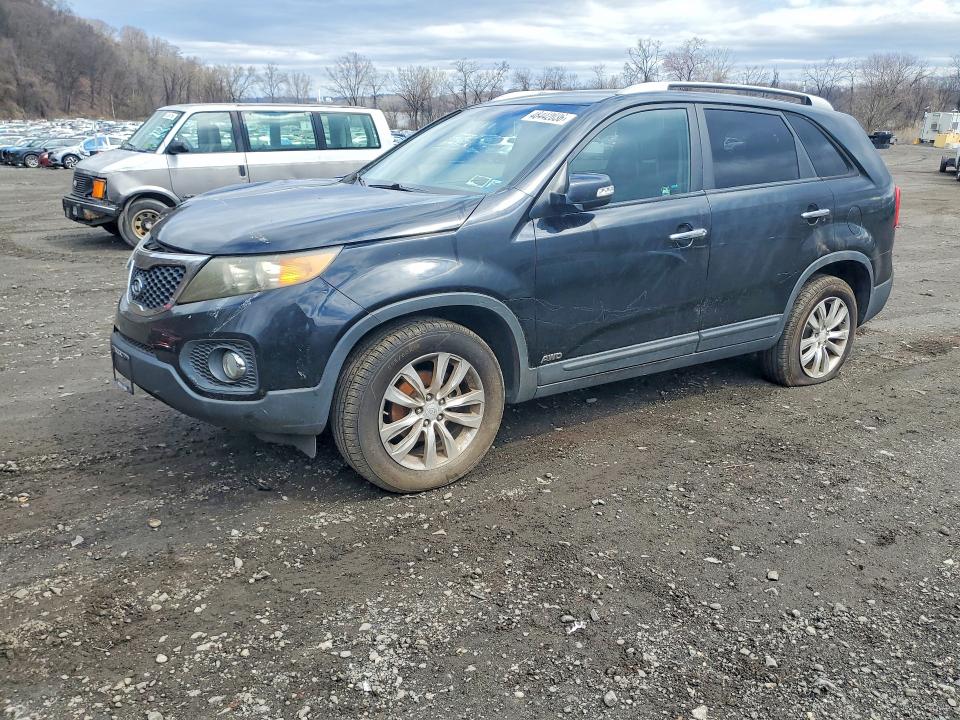 2011 Kia Sorento VIN 5XYKTDA2XBG141257 — COPART salvage auction photo