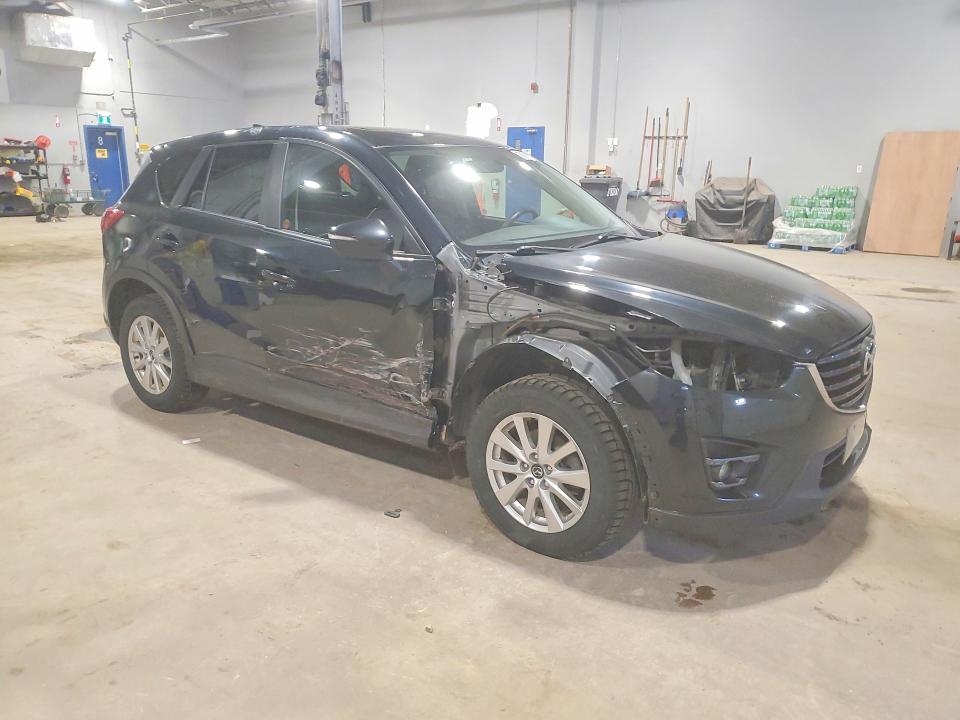 2016 Mazda Cx-5 VIN JM3KE2CY7G0815109 COPART salvage auction — SIDE, NS - SALVAGE TITLE, sold $3,100 on 2026-07-09 (photo 4)