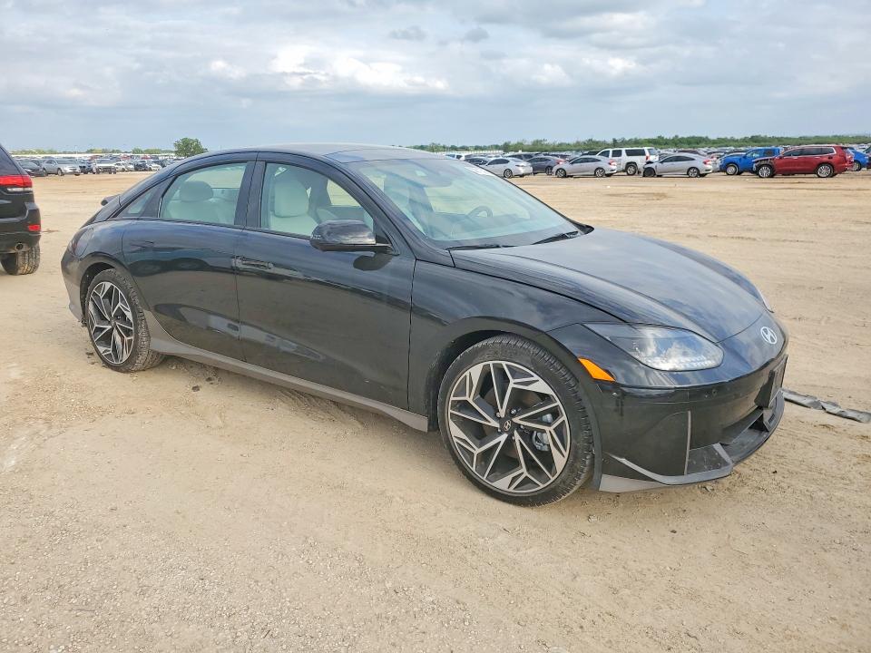 2025 Hyundai Ioniq 6 VIN KMHM54AA2SA095865 COPART salvage auction — SIDE, TX - SALVAGE VEHICLE TITLE, sold $14,500 on 2026-07-30 (photo 4)