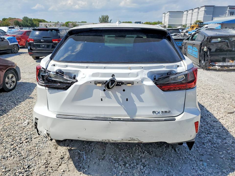 2019 Lexus Rx VIN 2T2ZZMCA4KC140386 COPART salvage auction — REAR END, Fl - Cert Of Title W/Slvg History (P), sold $19,600 on 2026-07-14 (photo 6)