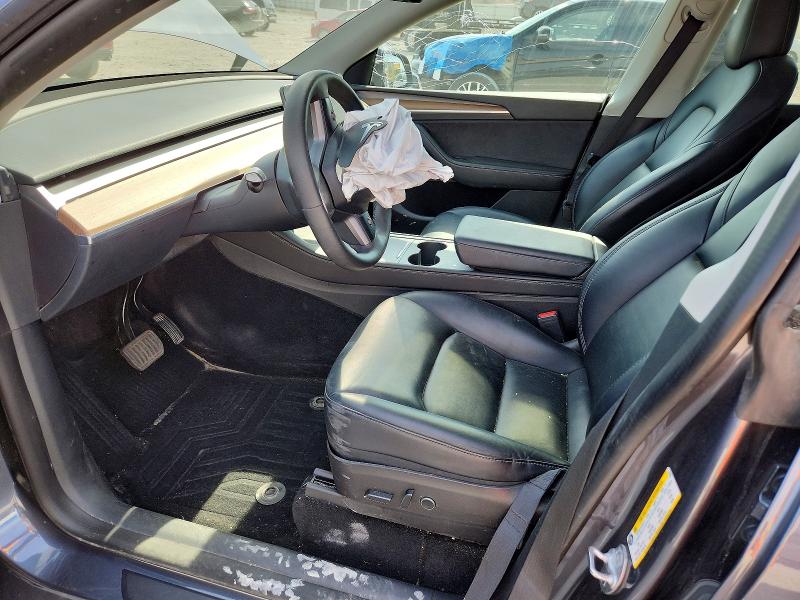 2022 Tesla Model y VIN 7SAYGDEE2NF574931 COPART salvage auction — FRONT END, Il - Salvage Certificate, sold $9,200 on 2026-07-15 (photo 7)
