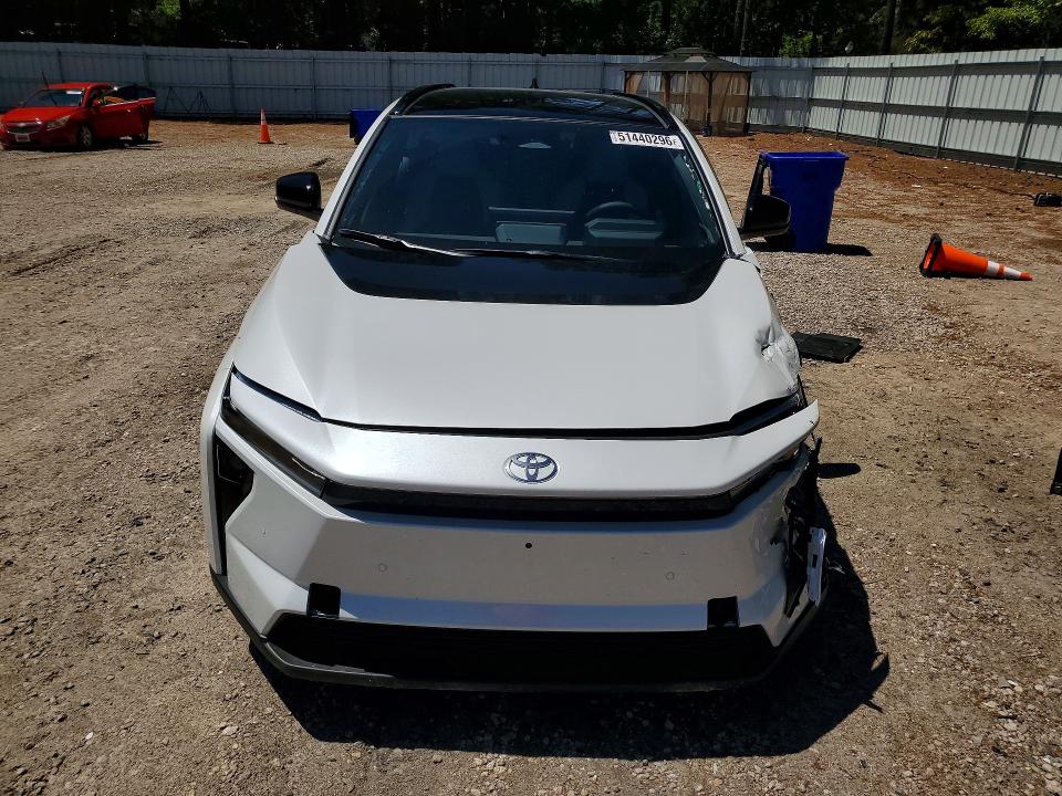 2026 Toyota Bz4x VIN JTMBDAFB2TA006151 COPART salvage auction — SIDE, Nc - Salvage Certificate Of Title, sold $11,200 on 2026-07-31 (photo 5)