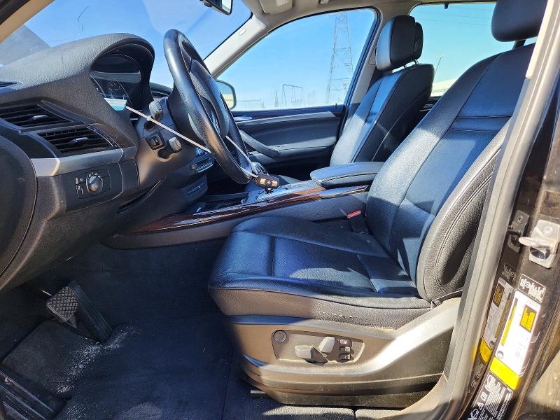 2012 BMW X5 VIN 5UXZV4C52CL987533 COPART salvage auction — MINOR DENT/SCRATCHES, Tx - Dis/Dlr/Exp Only Salvage Title, sold $500 on 2026-07-20 (photo 7)