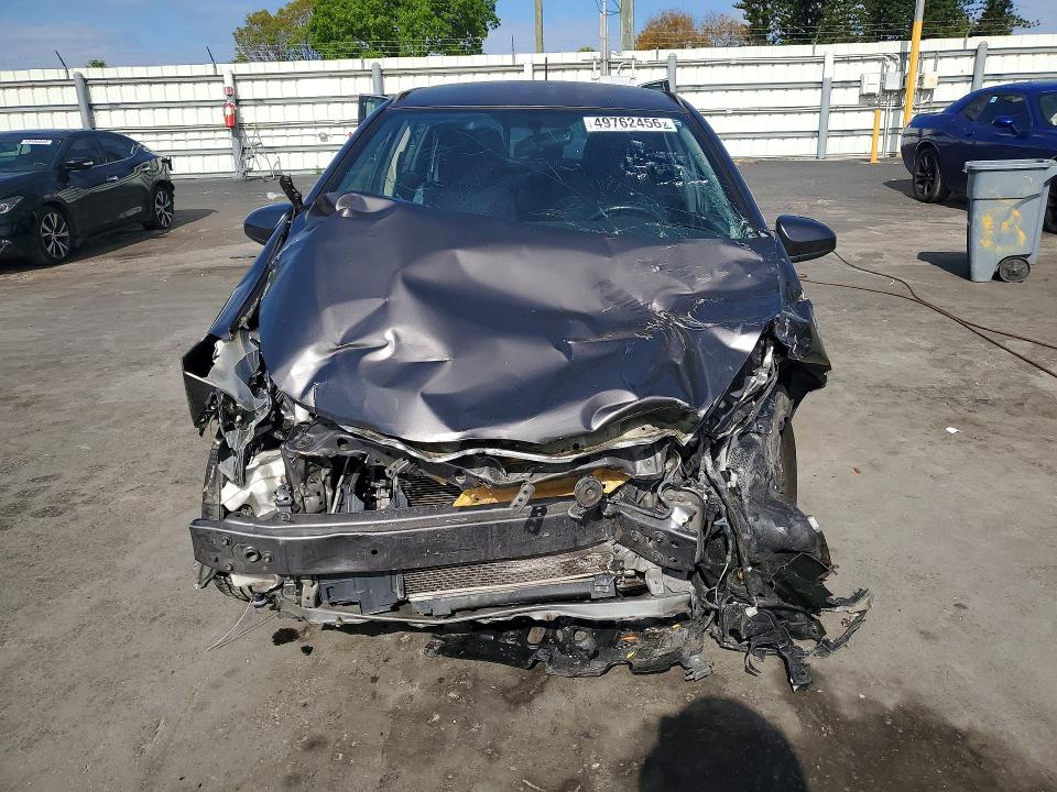 2014 Toyota Yaris VIN JTDKTUD34ED581420 COPART salvage auction — FRONT END, Fl - Cert Of Title Slvg Rebuildable, sold $700 on 2026-07-27 (photo 5)