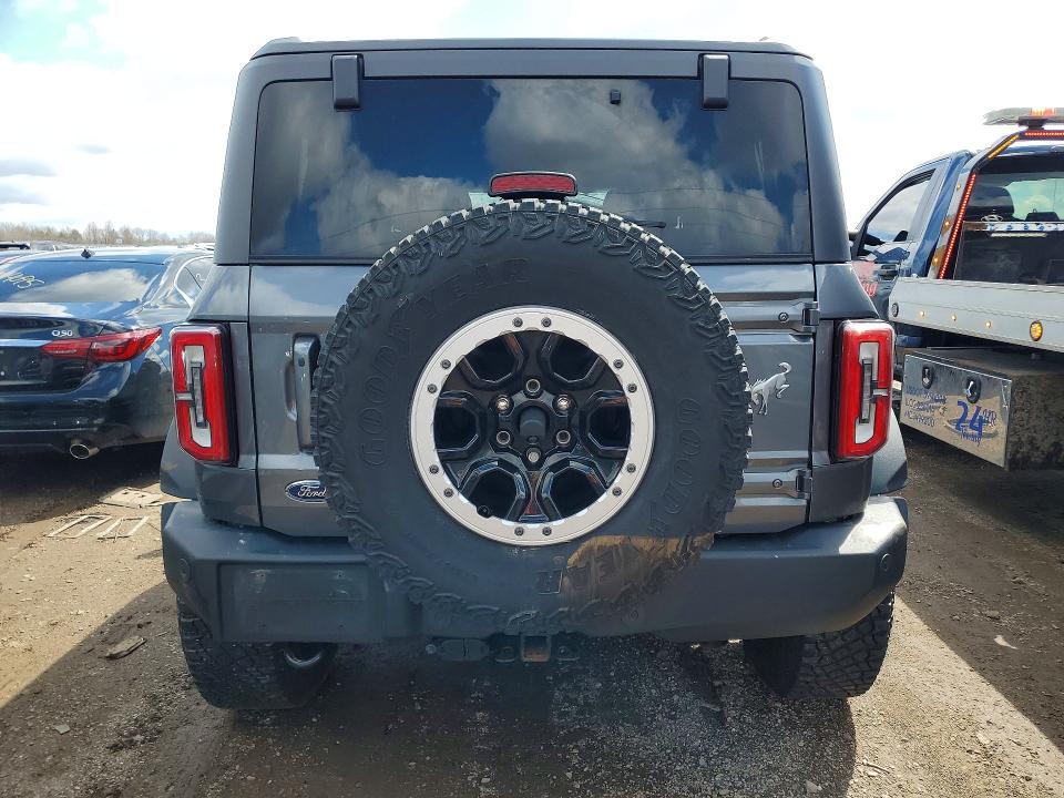 2023 Ford Bronco VIN 1FMDE5DH1PLB01794 COPART salvage auction — ENGINE BURN, Il - Salvage Certificate, sold $10,000 on 2026-07-02 (photo 6)