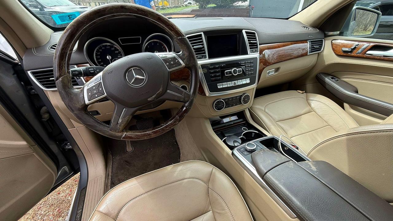 2014 Mercedes-Benz ML-Class VIN 4JGDA7DBXEA299058 COPART salvage auction — Mechanical, NH - CERTIFICATE OF TITLE (P), sold $2,850 on 2026-06-10 (photo 9)
