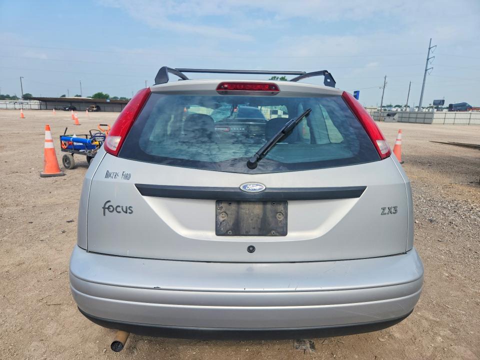2000 Ford Focus VIN 3FAFP3136YR245502 COPART salvage auction — ENGINE BURN, Tx - Salvage Vehicle Title, sold $25 on 2026-07-08 (photo 6)