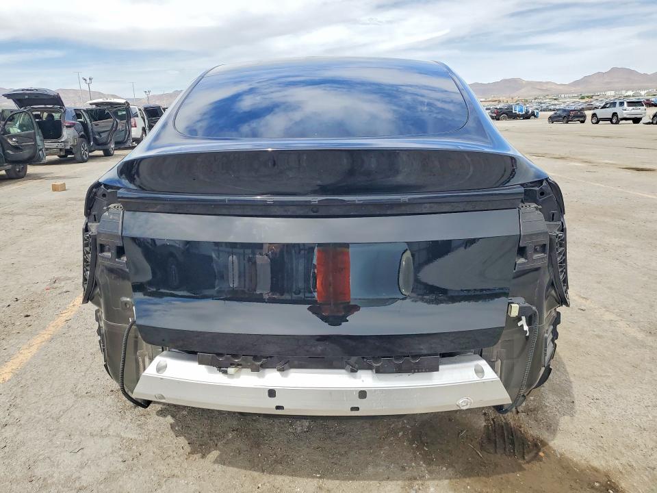 2026 Tesla Model y VIN 7SAYGDED7TA595033 COPART salvage auction — SIDE, Nv - Salvage Title, sold $17,100 on 2026-07-02 (photo 6)