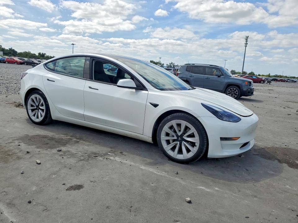 2023 Tesla VIN 5YJ3E1EA5PF558721 COPART salvage auction — SIDE, Fl - Certificate Of Destruction, sold $7,800 on 2026-07-15 (photo 4)