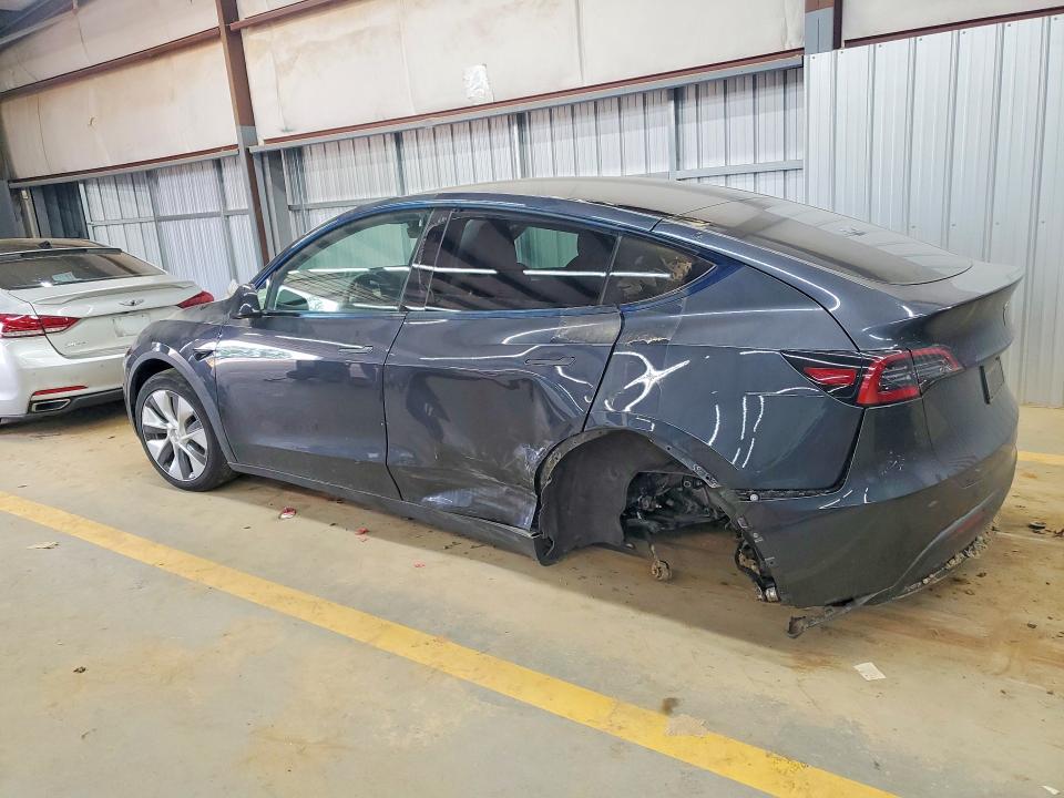 2024 Tesla Model y VIN 7SAYGDEE9RF988634 COPART salvage auction — SIDE, Nc - Salvage Certificate Of Title, sold $10,000 on 2026-07-15 (photo 2)