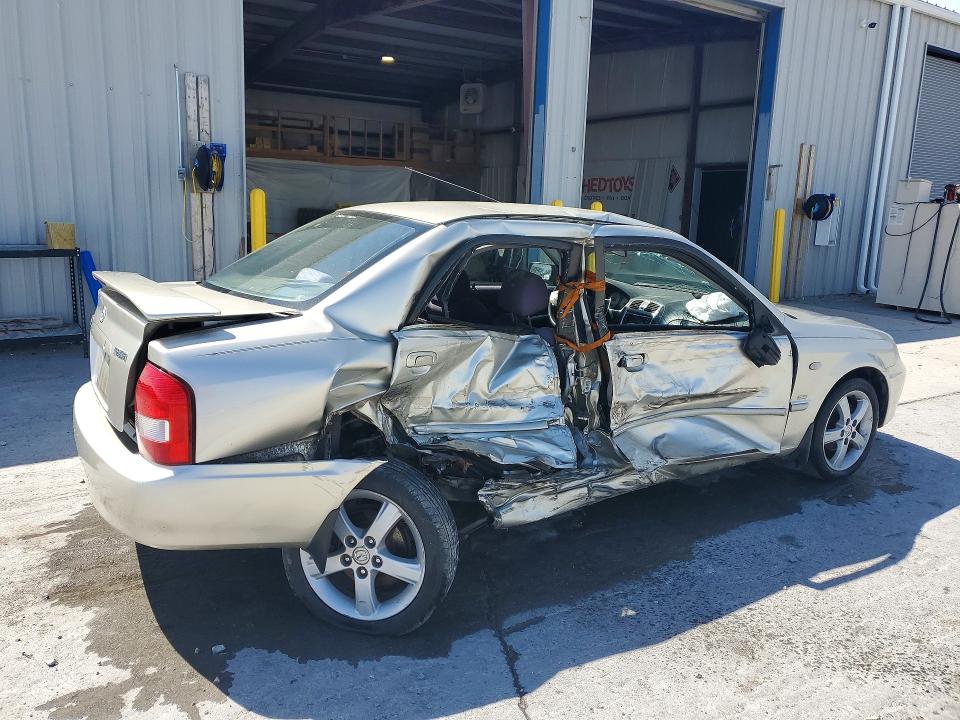 2003 Mazda Protege VIN JM1BJ225131110872 COPART salvage auction — SIDE, MO - SALVAGE CERTIFICATE OF TITLE, sold $50 on 2026-07-27 (photo 3)