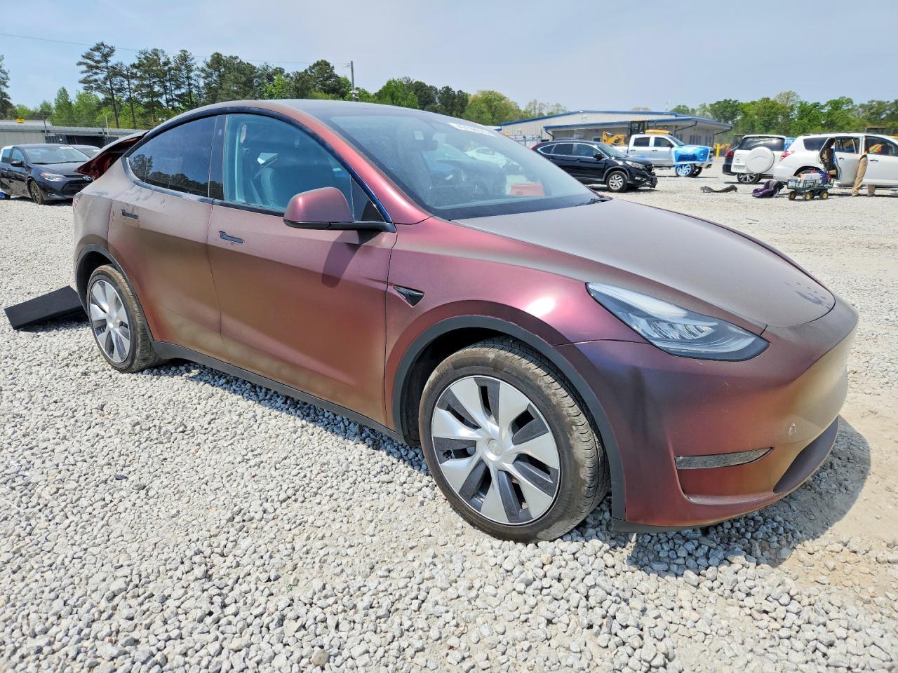 2023 Tesla Model Y VIN 7SAYGDEE8PA026125 COPART salvage auction — Rear End, GA - CERT OF TITLE-SALVAGE, sold $8,000 on 2026-06-30 (photo 4)
