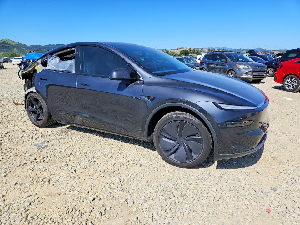 2026 Tesla Model y VIN 7SAYGDED2TF414021 COPART salvage auction — REAR END, Ca - Salvage Certificate, sold $16,300 on 2026-07-07 (photo 4)