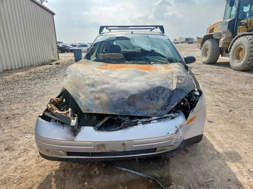 2000 Ford Focus VIN 3FAFP3136YR245502 COPART salvage auction — ENGINE BURN, Tx - Salvage Vehicle Title, sold $25 on 2026-07-08 (photo 5)