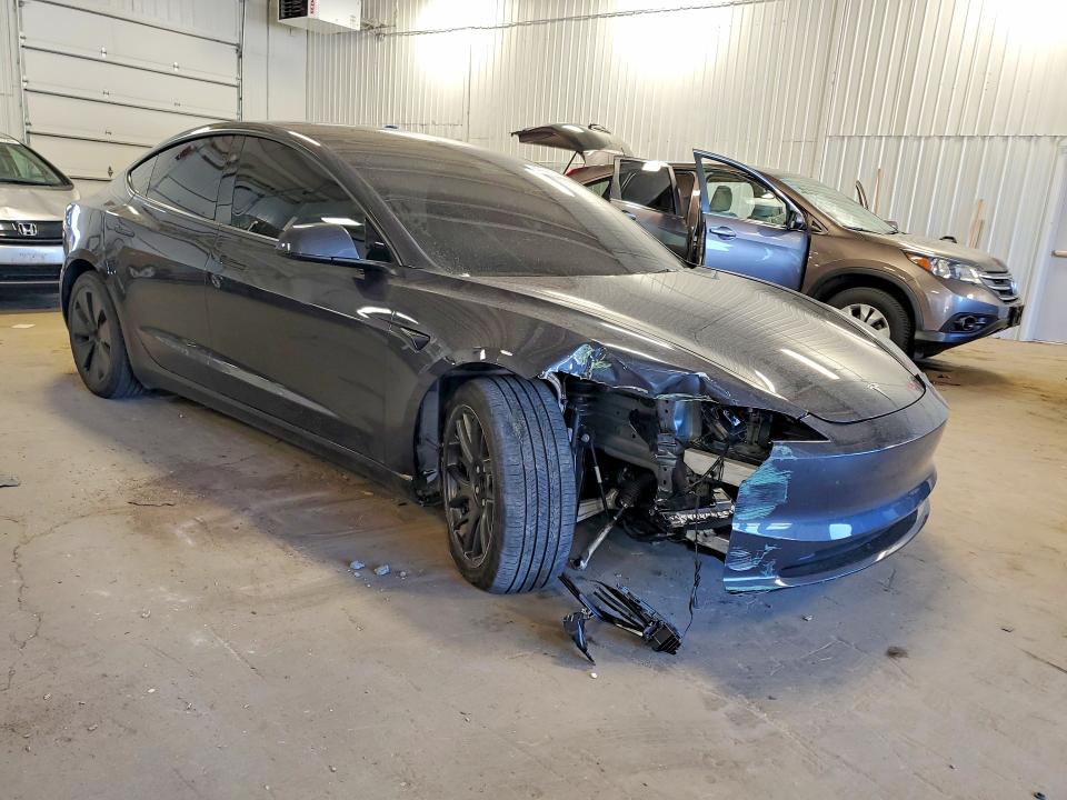 2025 Tesla Model 3 VIN 5YJ3E1EB7SF023312 COPART salvage auction — FRONT END, MN - CERT OF TITLE-SALVAGE, sold $14,200 on 2026-07-07 (photo 4)