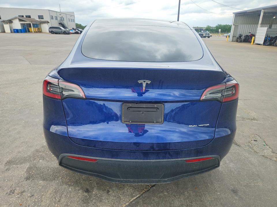 2024 Tesla Model y VIN 7SAYGDEE8RF201611 COPART salvage auction — SIDE, TX - SALVAGE VEHICLE TITLE, sold $12,000 on 2026-07-23 (photo 6)
