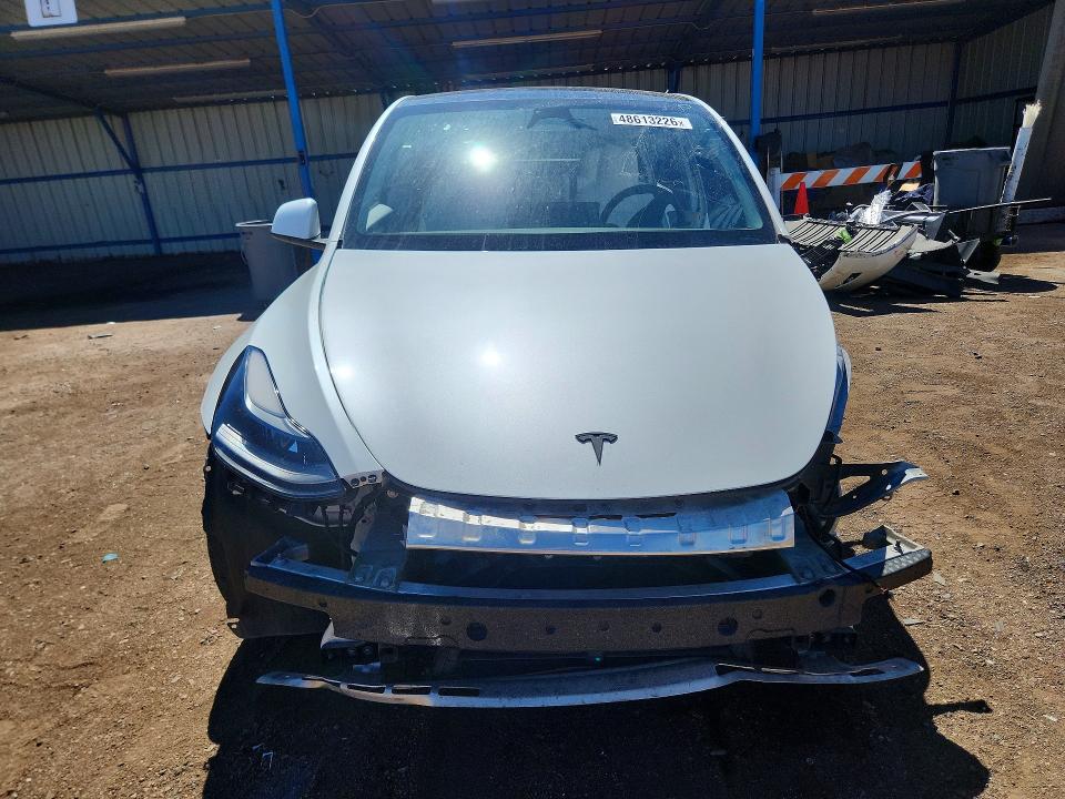 2023 Tesla Model y VIN 7SAYGDEF6PF936786 COPART salvage auction — SIDE, Co - Salvage Title, sold $11,100 on 2026-07-06 (photo 5)