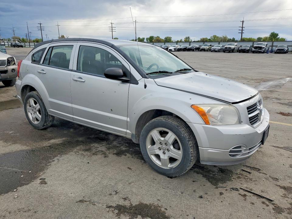 2009 Dodge Caliber VIN 1B3HB48CX9D103274 COPART salvage auction — SIDE, Id - Salvage Certificate Of Title, sold $125 on 2026-07-09 (photo 4)