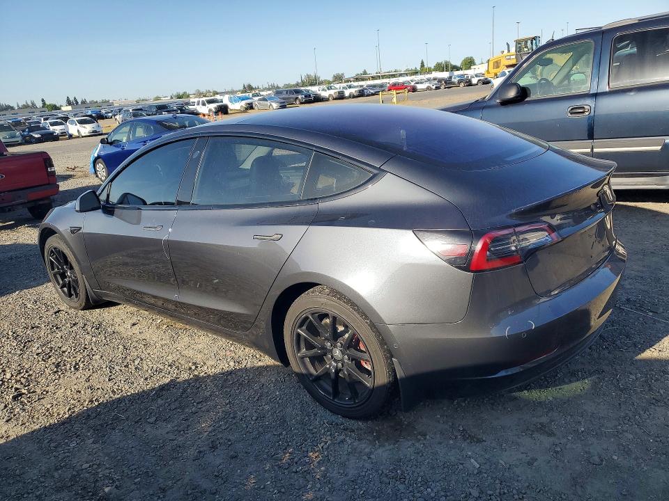 2017 Tesla Model 3 VIN 5YJ3E1EA9HF002218 COPART salvage auction — SIDE, Ca - Salvage Certificate, sold $4,250 on 2026-07-02 (photo 2)