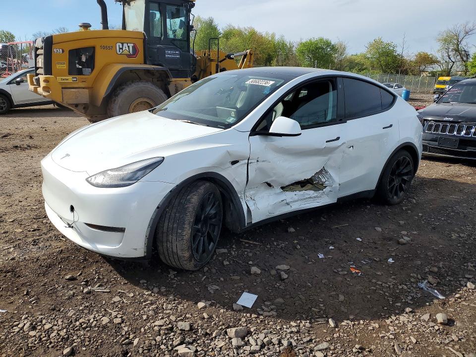 2023 Tesla Model y VIN 7SAYGDEE9PA025095 COPART salvage auction — SIDE, Salvage Title, sold $9,100 on 2026-07-15 (photo 1)