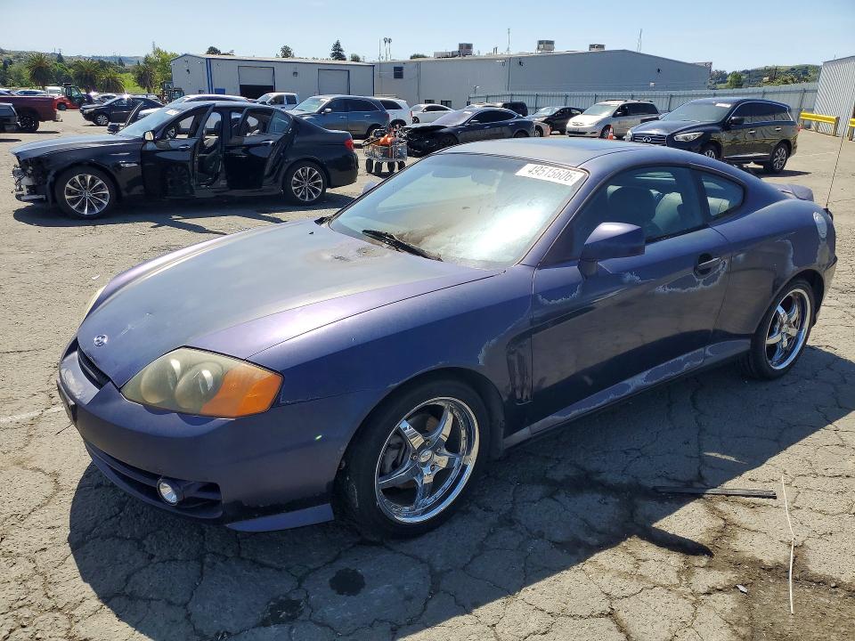 2003 Hyundai Tiburon VIN KMHHN65F03U017880 COPART salvage auction — ENGINE BURN, Ca - Salvage Certificate, sold $200 on 2026-07-10 (photo 1)