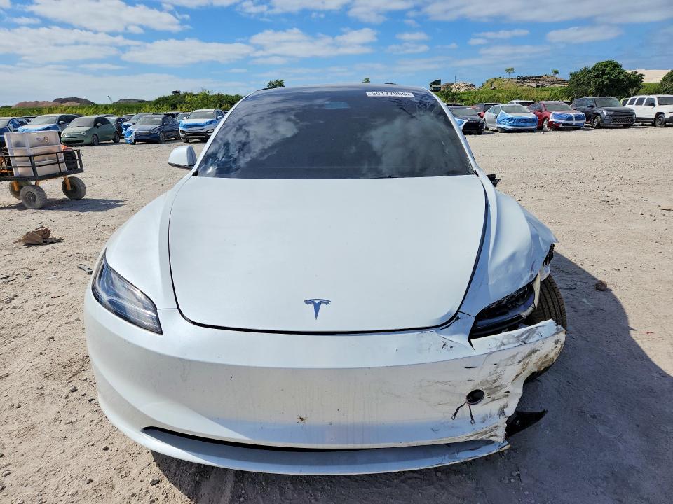 2025 Tesla Model 3 VIN 5YJ3E1EA8SF039977 COPART salvage auction — FRONT END, Fl - Certificate Of Destruction, sold $15,000 on 2026-07-02 (photo 5)