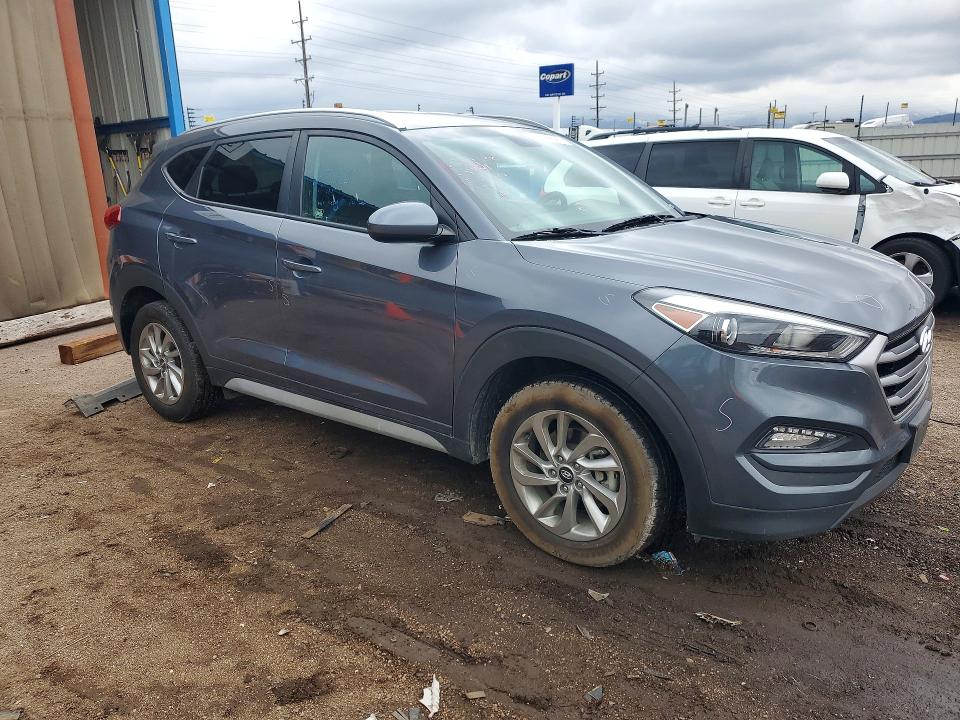 2018 Hyundai Tucson VIN KM8J33A41JU610560 COPART salvage auction — VANDALISM, CO - SALVAGE TITLE, sold $2,800 on 2026-07-06 (photo 4)