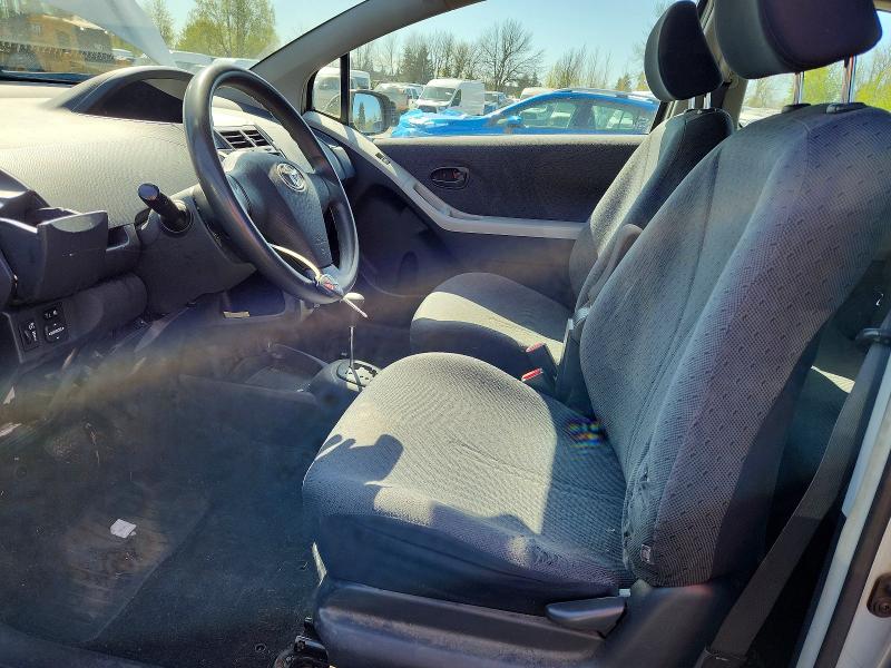 2011 Toyota Yaris VIN JTDJT4K33B5333051 COPART salvage auction — SIDE, Or - Salvage Title Certificate, sold $225 on 2026-07-06 (photo 7)