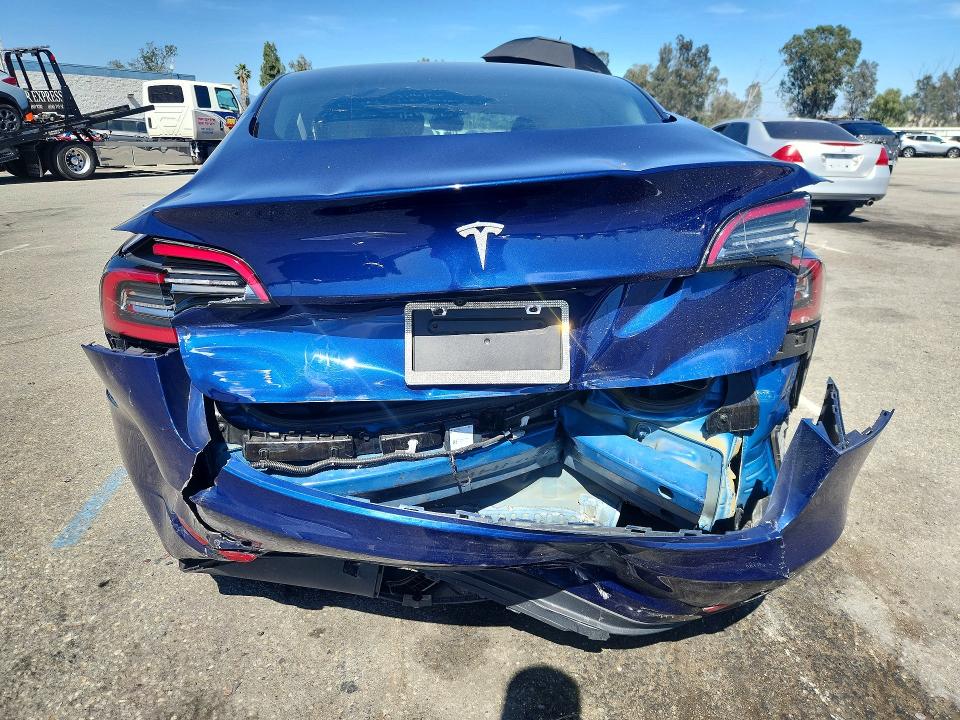 2023 Tesla Model 3 VIN 5YJ3E1EA6PF463312 COPART salvage auction — REAR END, Ca - Salvage Certificate, sold $4,400 on 2026-07-02 (photo 6)
