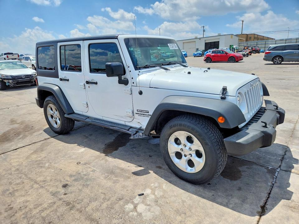 2015 Jeep Wrangler / VIN 1C4BJWDGXFL525977 COPART salvage auction — SIDE, Tx - Salvage Vehicle Title, sold $7,200 on 2026-07-02 (photo 4)