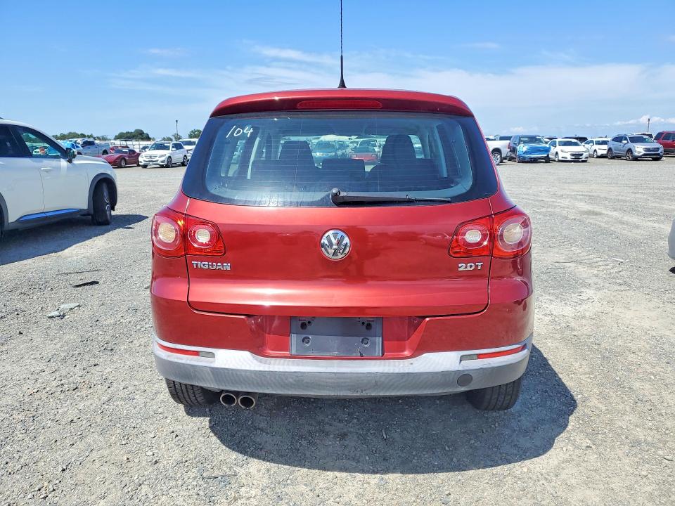 2010 Volkswagen Tiguan VIN WVGAV7AX4AW000474 COPART salvage auction — MINOR DENT/SCRATCHES, Ca - Dis/Dlr/Exp Only Clean Title (P), sold $325 on 2026-07-09 (photo 6)
