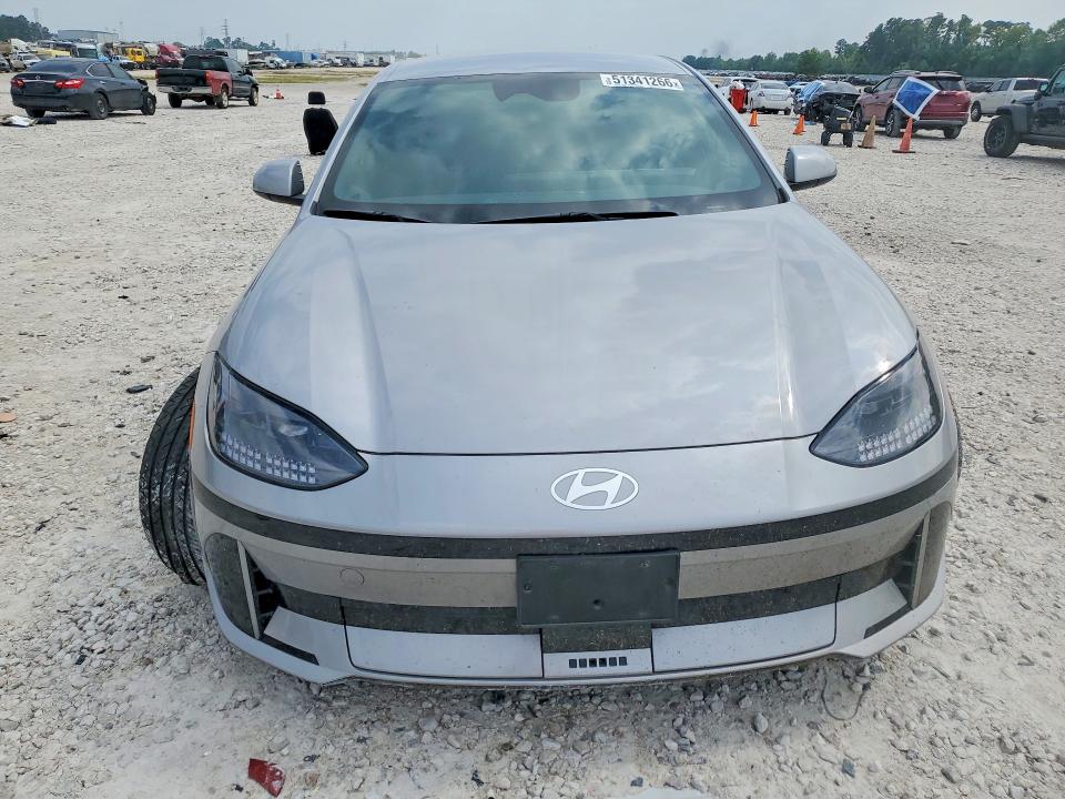 2024 Hyundai Ioniq 6 VIN KMHM34AC5RA066653 COPART salvage auction — SIDE, Tx - Certificate Of Title, sold $14,500 on 2026-07-07 (photo 5)