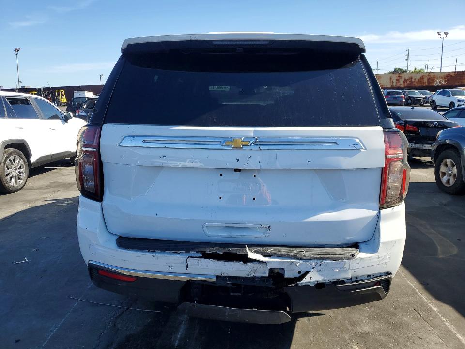 2023 Chevrolet Suburban VIN 1GNSKCKD9PR212395 COPART salvage auction — Rear End, Id - Dis/Dlr/Exp Only Salvage Title, sold $23,400 on 2026-05-22 (photo 6)