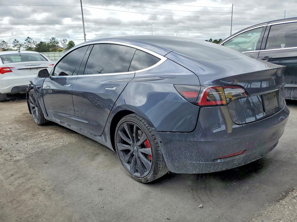 2020 Tesla Model 3 VIN 5YJ3E1EC7LF733742 COPART salvage auction — SIDE, FL, sold $5,000 on 2026-08-28 (photo 2)