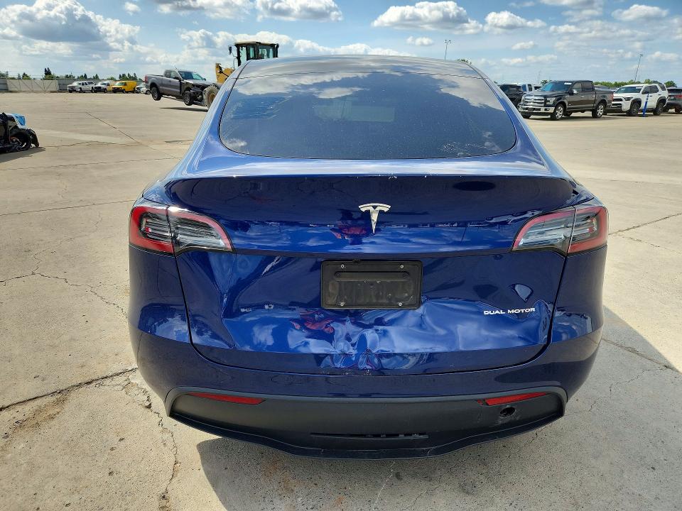 2025 Tesla Model y VIN 7SAYGAEE9SF230779 COPART salvage auction — FRONT END, Salvage Title, sold $12,700 on 2026-07-20 (photo 6)