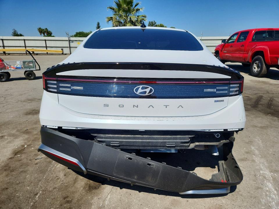 2026 Hyundai Sonata VIN KMHL24JJ2TA151955 COPART salvage auction — SIDE, Salvage Title, sold $7,200 on 2026-07-10 (photo 6)
