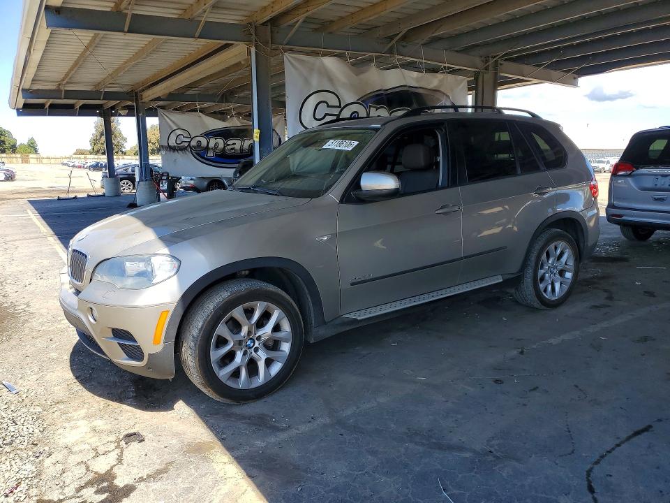 2011 BMW X5 VIN 5UXZV4C54BL738911 — COPART salvage auction photo